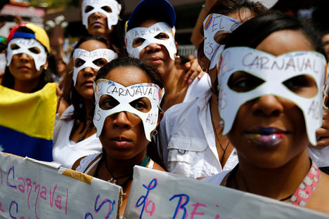 VenezuelaProtestersWearingCarnivalMasks2014-03-06.jpg